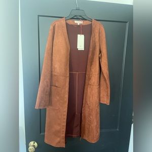 Solitaire suede dress coat.